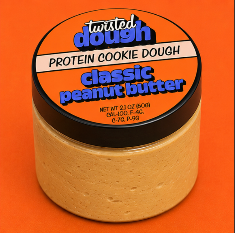 Jar of Twisted Dough Protein Cookie Dough Classic Peanut Butter on an orange background