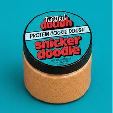 Load image into Gallery viewer, Jar of Twisted Dough Protein Cookie Dough Snickerdoodle flavor on a blue background