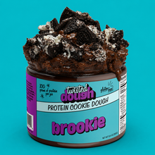 Load image into Gallery viewer, Jar of Twisted Dough Protein Cookie Dough with visible cookie pieces on a teal background