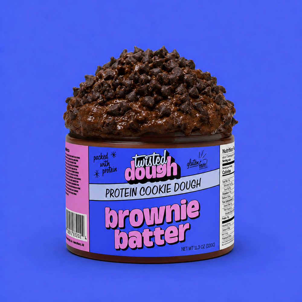 Container of Twisted Dough Protein Cookie Dough Brownie Batter on a blue background