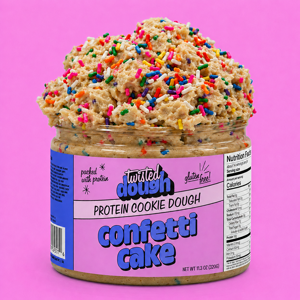 Jar of Twisted Dough Confetti Cake protein cookie dough with colorful sprinkles on a pink background