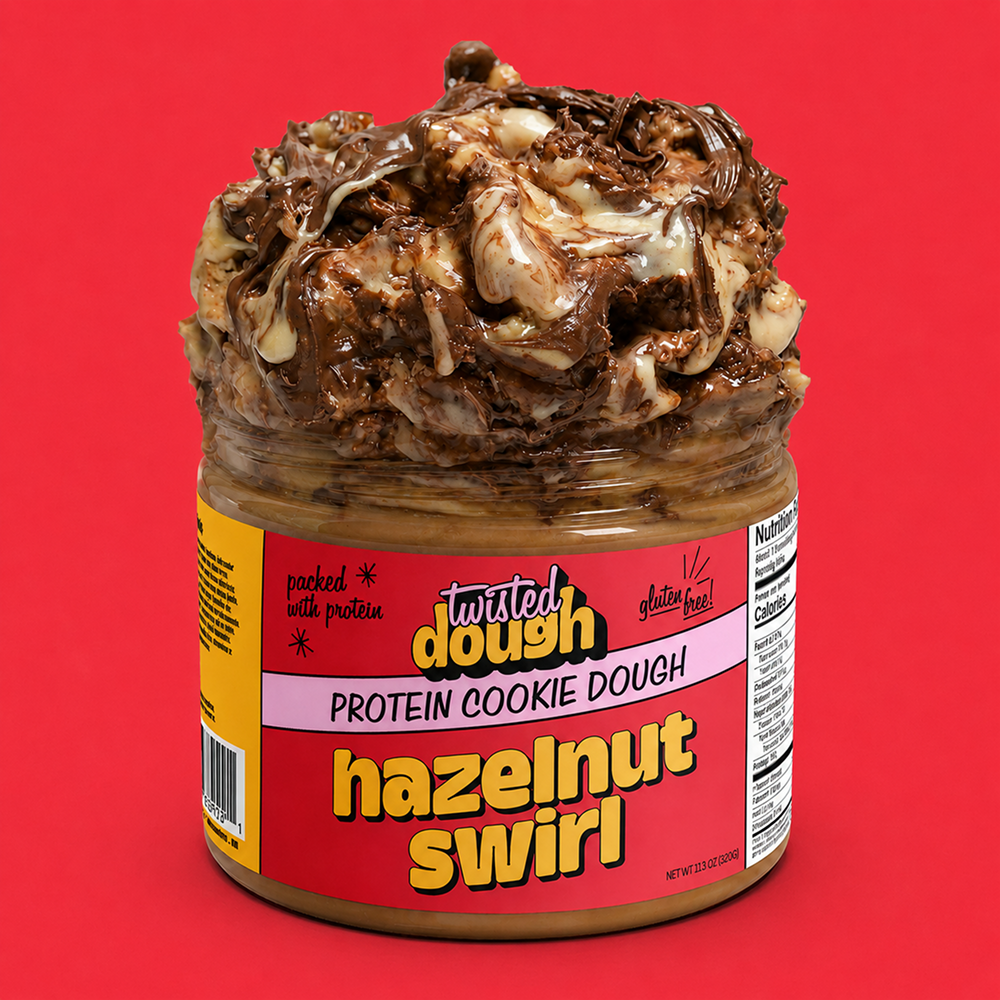 Jar of Twisted Dough Protein Cookie Dough with hazelnut swirl on a red background
