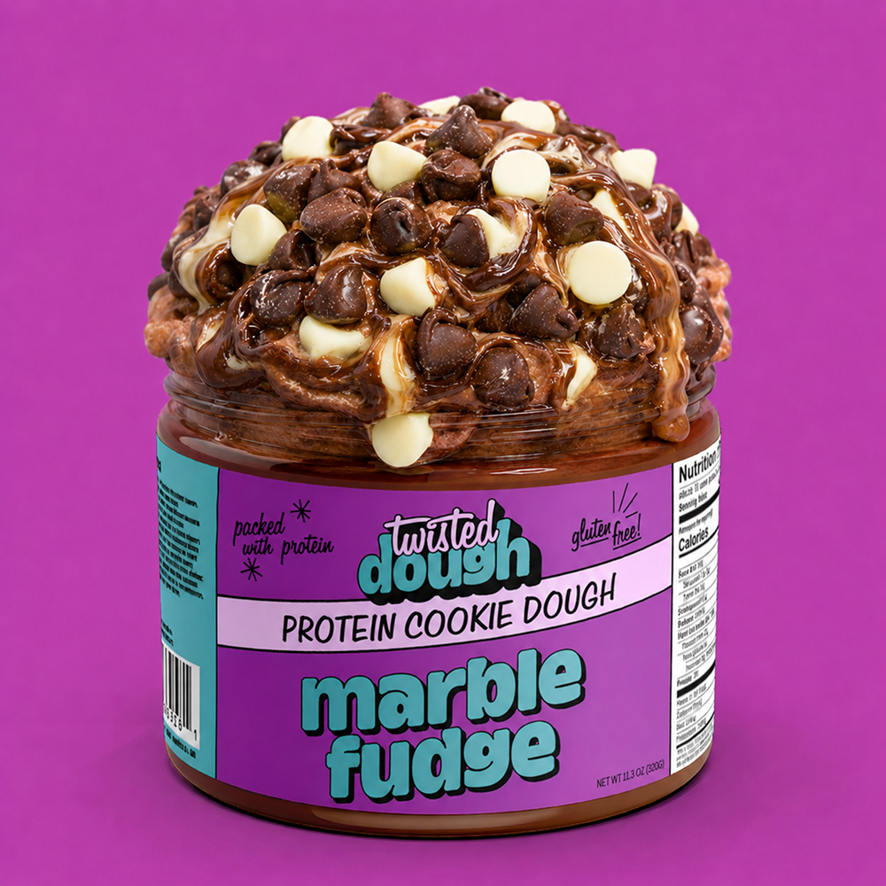 Jar of Twisted Dough Protein Cookie Dough with chocolate chips on a purple background