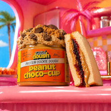 Load image into Gallery viewer, Twisted Dough Peanut Choco-Cup protein cookie dough jar with a sandwich on a pink background