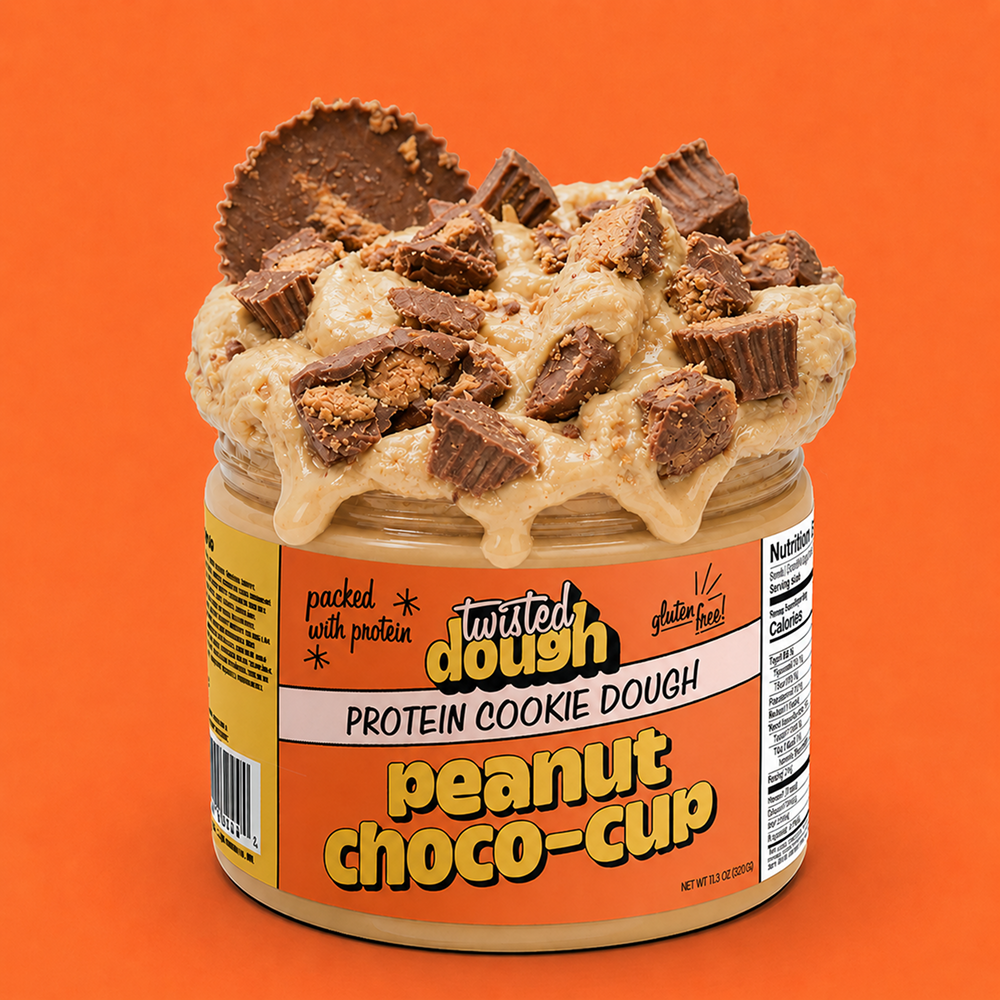 Jar of Twisted Dough Protein Cookie Dough with a scoop on an orange background