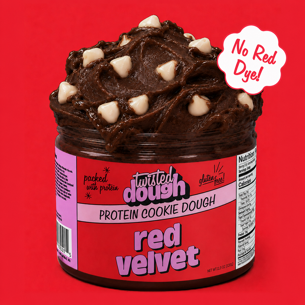 Jar of Twisted Dough Red Velvet Protein Cookie Dough on a red background