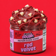 Load image into Gallery viewer, Jar of Twisted Dough Red Velvet Protein Cookie Dough on a red background